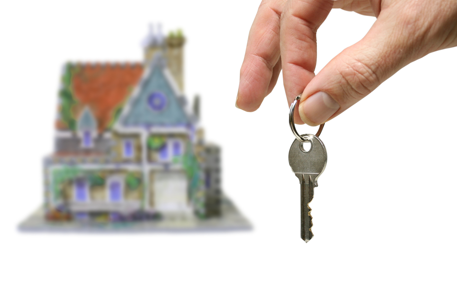 a new home,house with hand and key