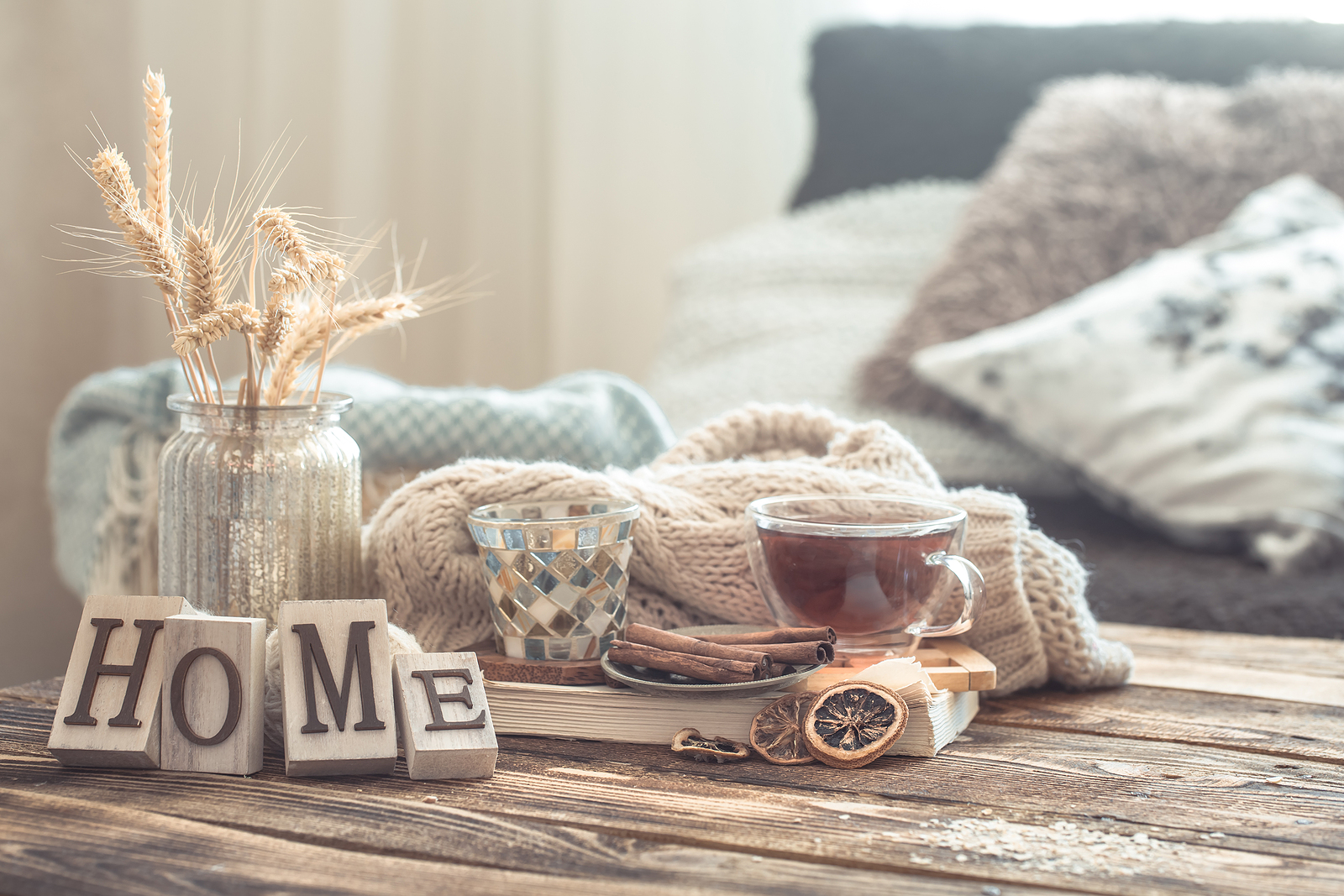 Still life details of home interior on a wooden table with letters home, the concept of coziness and home atmosphere .Living room