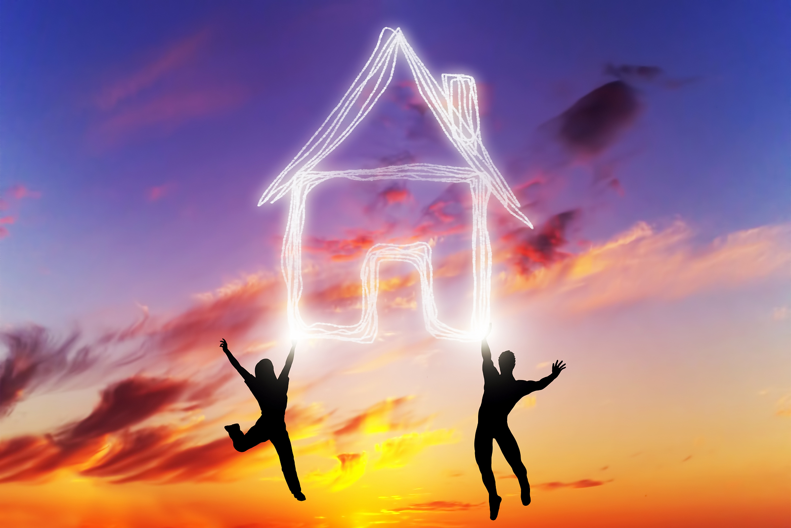 Happy couple jump and make a house symbol of light. Dreaming abo
