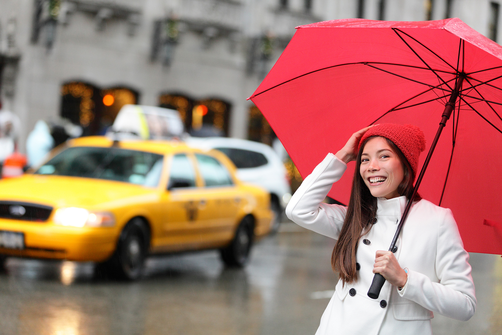 New York City Manhattan woman with fall umbrella walking happy i